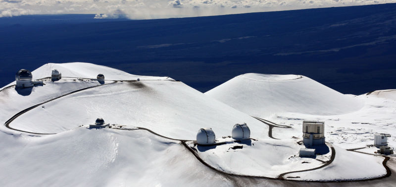 Aerial view of observatories atop Mauna Kea. Image: Tim Wright/AP